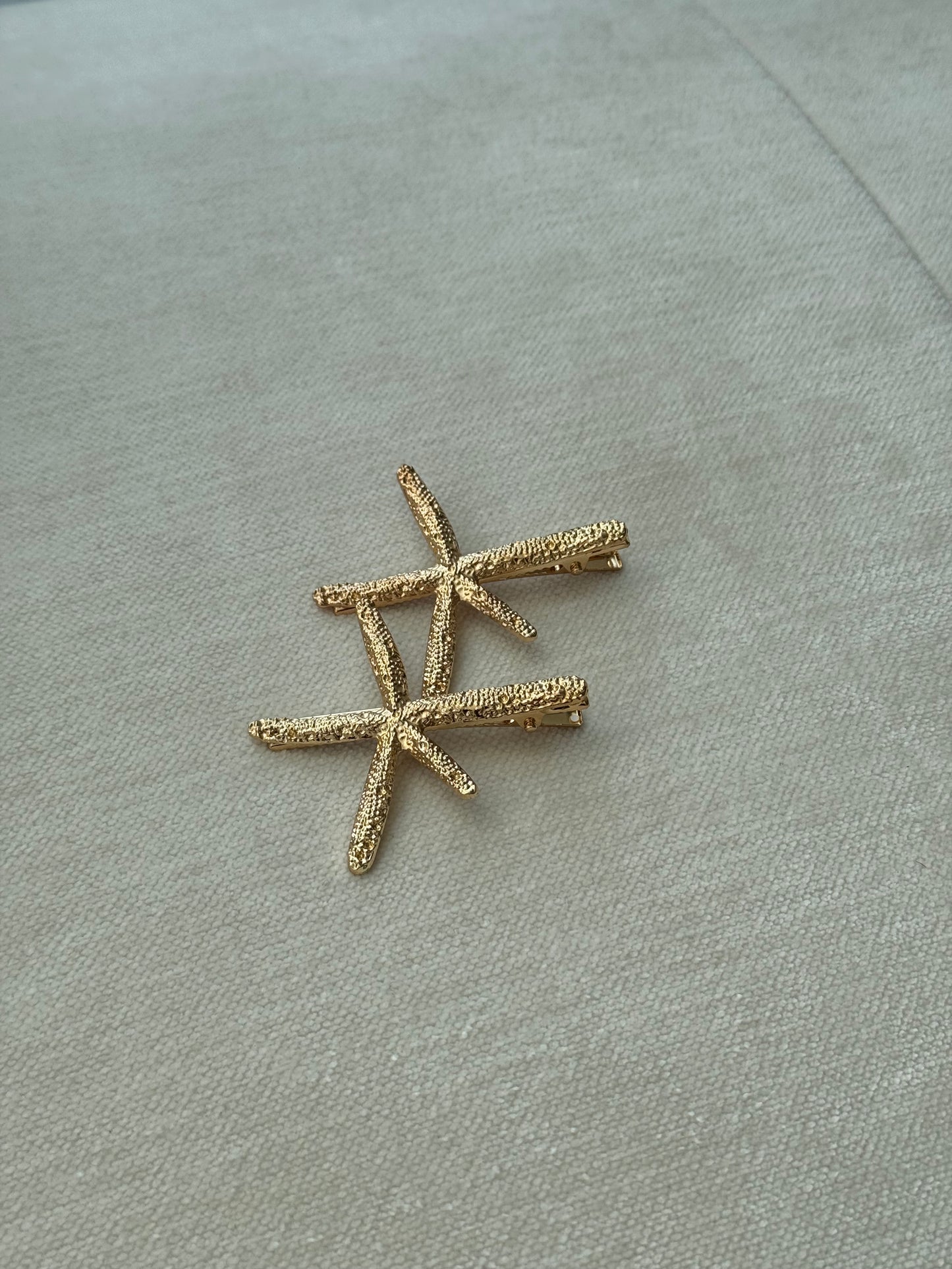gold starfish hairclip