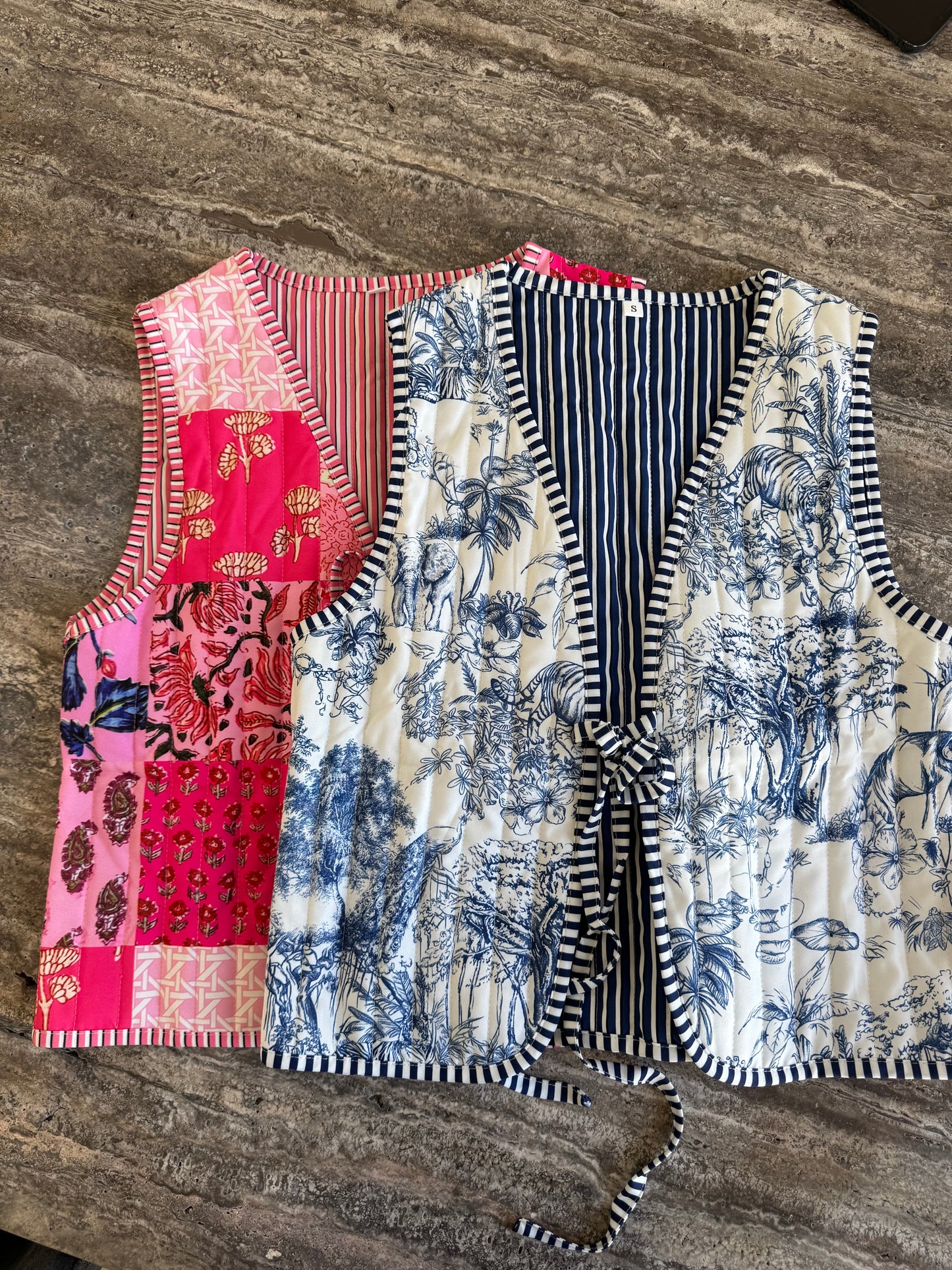 blue drawing vest