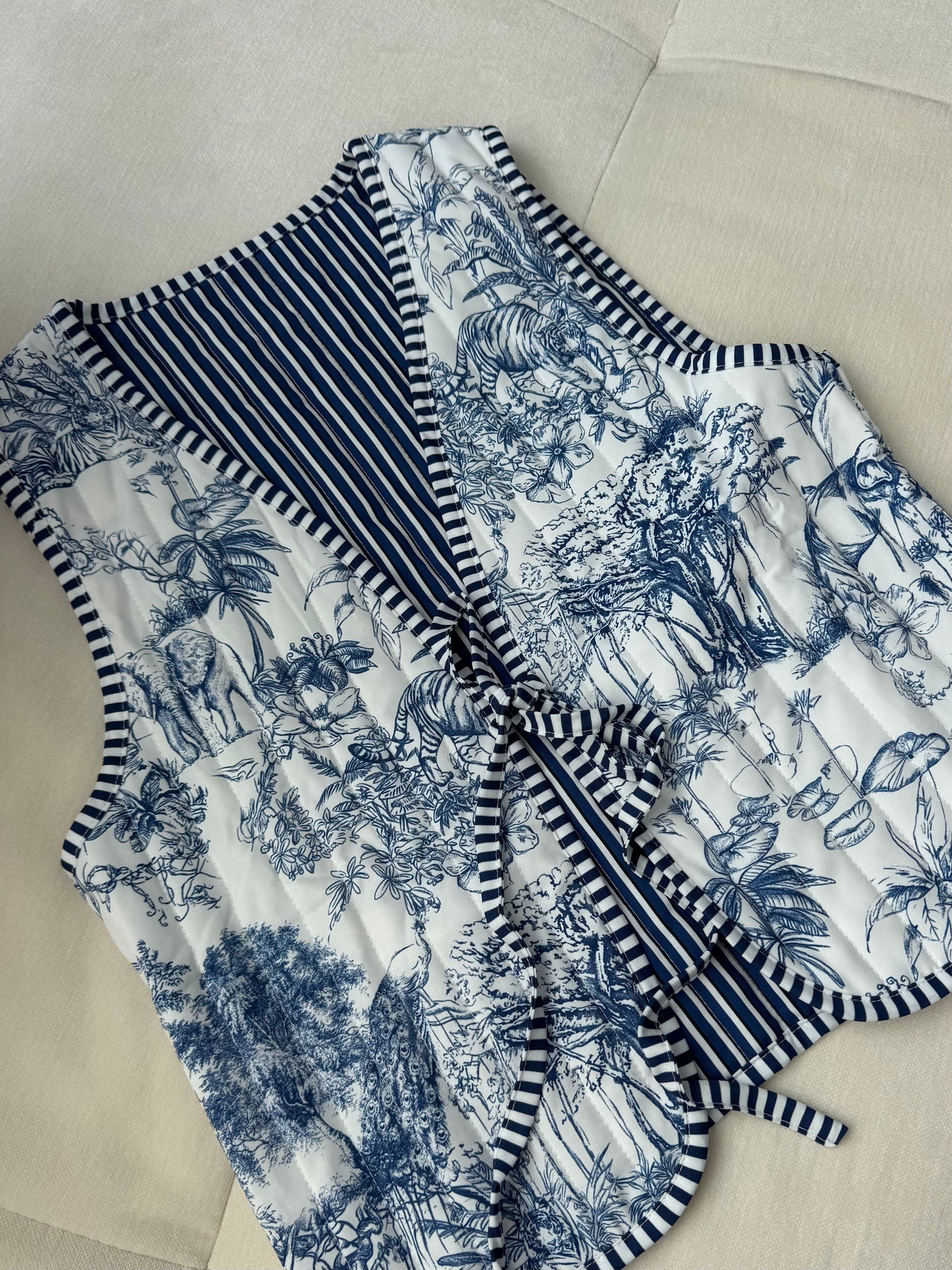 blue drawing vest