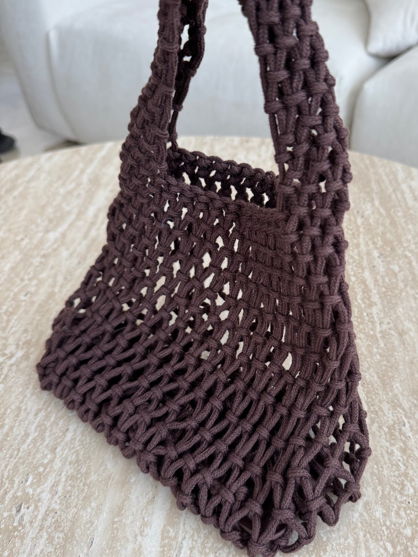 brown net beach bag