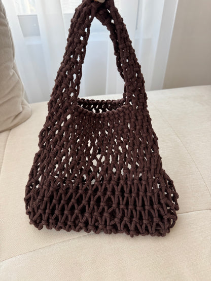 brown net beach bag